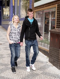 A cute teenage blonde enjoys riding a massive beefstick